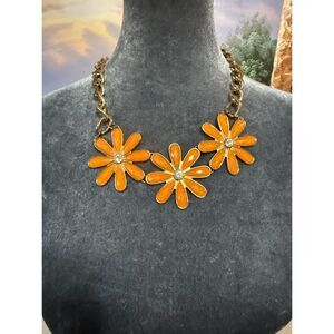 orange resin flowers with rhinestone centers gold -tone statement